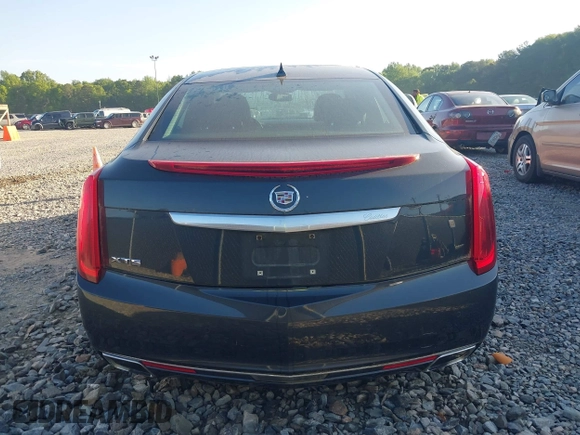 2013 Cadillac XTS Luxury with VIN 2G61P5S3XD9141306, listed as a IAAI auction lot 42034077 with 120,294 mi miles. Bid and sale history available at carsss.com. Image 16.