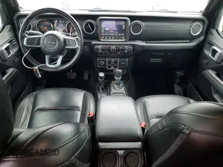 2020 Jeep Wrangler Unlimited Sahara with VIN 1C4HJXEG9LW337590, listed as a Copart auction lot 59197125 with 57,733 mi miles and Salvage title. Bid and sale history available at DreamBid. Image 8.