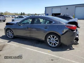 2017 Mazda 6 Touring with VIN JM1GL1V56H1121184, listed as a Copart auction lot 51608785 with 103,557 mi miles and Salvage Title. Bid and sale history available at DreamBid. Image 2.