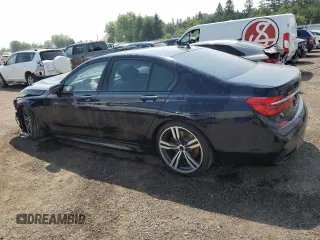 2017 BMW 7 Series 750i xDrive with VIN WBA7B0C57HG527064, listed as a Copart auction lot 62463405 with 103,454 mi miles and Salvage title. Bid and sale history available at DreamBid. Image 2.
