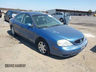 2002 Mercury Sable GS z VIN 1MEFM50U92G640361, wystawiony jako IAAI lot #42382802 z przebiegiem 104 625 mil mil oraz . Historia ofert i sprzedaży dostępna na DreamBid. Obrazek 1.