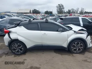 2020 Toyota C-HR LE with VIN JTNKHMBX9L1092934, listed as a IAAI auction lot 42021972 with 56,777 mi miles and . Bid and sale history available at DreamBid. Image 13.