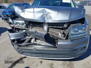 2018 Volkswagen Atlas SE with VIN 1V2CR2CA0JC571988, listed as a IAAI auction lot 41848862 with 96,426 mi miles and . Bid and sale history available at DreamBid. Image 6.