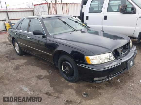 1999 Infiniti Q45 z VIN JNKBY31A3XM602466, wystawiony jako IAAI lot #41721377 z przebiegiem 113 158 mil mil oraz . Historia ofert i sprzedaży dostępna na DreamBid. Obrazek 1.
