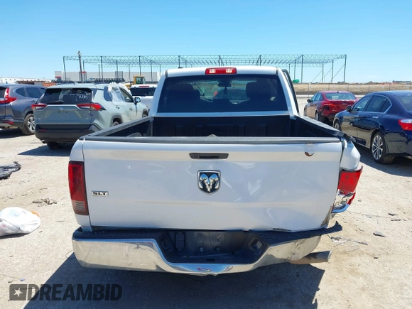 2021 Ram 1500 SLT with VIN 1C6RR6TTXMS517345, listed as a IAAI auction lot 42314123 with 107,307 mi miles and . Bid and sale history available at DreamBid. Image 16.