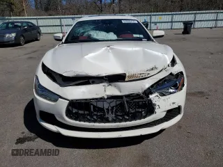 2017 Maserati Ghibli S Q4 z VIN ZAM57RTA6H1247079, wystawiony jako Copart lot #52099755 z przebiegiem 124 159 mil mil oraz Szkody całkowita. Historia ofert i sprzedaży dostępna na DreamBid. Obrazek 5.