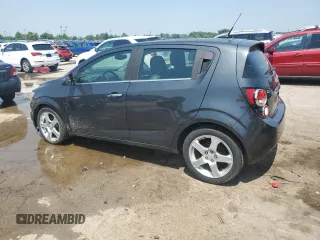 2014 Chevrolet Sonic LTZ z VIN 1G1JE6SB5E4241777, wystawiony jako Copart lot #60117705 z przebiegiem 139 287 mil mil oraz Czysty tytuł • Clean title. Historia ofert i sprzedaży dostępna na DreamBid. Obrazek 2.