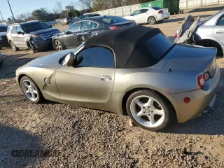 2005 BMW Z4 2.5i with VIN 4USBT33585LS54029, listed as a Copart auction lot 86951144 with 114,583 mi miles and Salvage Title. Bid and sale history available at carsss.com. Image 2.