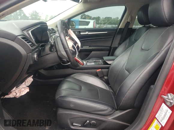 2019 Ford Fusion Titanium z VIN 3FA6P0D99KR221328, wystawiony jako Copart lot #57104515 z przebiegiem 138 427 mil mil oraz Szkoda całkowita • Salvage title. Historia ofert i sprzedaży dostępna na DreamBid. Obrazek 7.