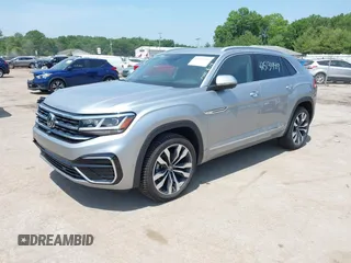 2021 Volkswagen Atlas SEL Premium R-Line with VIN 1V2FE2CA8MC235003, listed as a IAAI auction lot 42513449 with 44,466 mi miles and . Bid and sale history available at DreamBid. Image 2.