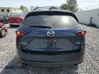 2021 Mazda CX-5 Touring with VIN JM3KFBCM0M0302015, listed as a Copart auction lot 55077305 with 40,558 mi miles and Salvage Title. Bid and sale history available at carsss.com. Image 6.