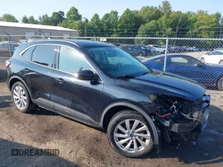2021 Ford Escape Titanium Hybrid with VIN 1FMCU9DZ0MUB14833, listed as a IAAI auction lot 42593983 with 51,852 mi miles and . Bid and sale history available at DreamBid. Image 1.