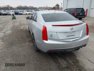 2014 Cadillac ATS Standard AWD with VIN 1G6AG5RX9E0179422, listed as a IAAI auction lot 41826487 with 121,061 mi miles and . Bid and sale history available at carsss.com. Image 3.