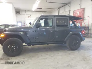2021 Jeep Wrangler Unlimited Sport S with VIN 1C4HJXDN8MW744768, listed as a IAAI auction lot 41894327 with 47,826 mi miles and . Bid and sale history available at DreamBid. Image 14.