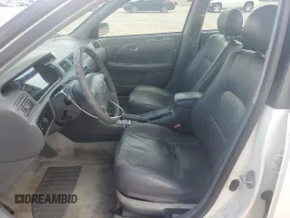 2001 Toyota Camry LE z VIN JT2BF22K310305858, wystawiony jako Copart lot #55231305 z przebiegiem 149 104 mil mil oraz Nie do naprawy • Non repairable. Historia ofert i sprzedaży dostępna na DreamBid. Obrazek 7.