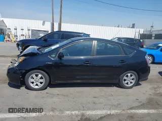 2007 Toyota Prius with VIN JTDKB20UX73228033, listed as a IAAI auction lot 41851668 with 242,138 mi miles. Bid and sale history available at carsss.com. Image 14.