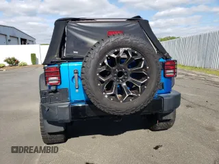 2016 Jeep Wrangler Unlimited Sport z VIN 1C4BJWDG3GL115622, wystawiony jako Copart lot #57872455 z przebiegiem 98 812 mil mil oraz Szkoda całkowita • Salvage title. Historia ofert i sprzedaży dostępna na DreamBid. Obrazek 6.