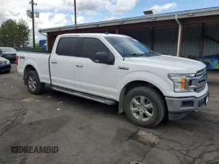 2019 Ford F-150 XL with VIN 1FTFW1E53KFC70522, listed as a Copart auction lot 55631445 with 117,292 mi miles and Salvage title. Bid and sale history available at DreamBid. Image 4.