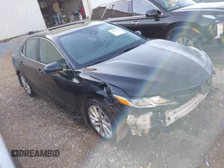 2023 Toyota Camry LE z VIN 4T1C11AK6PU735676, wystawiony jako IAAI lot #41760245 z przebiegiem 63 325 mil mil oraz . Historia ofert i sprzedaży dostępna na DreamBid. Obrazek 1.