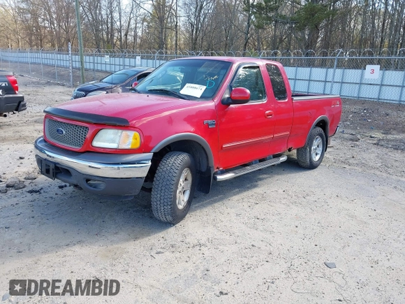 2003 Ford F-150 XL with VIN 2FTRX18L13CA49907, listed as a IAAI auction lot 41888674 with 132,944 mi miles. Bid and sale history available at carsss.com. Image 2.