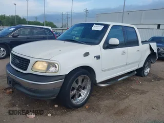 2001 Ford F-150 XLT with VIN 1FTRW07L81KE91672, listed as a IAAI auction lot 42021661 with 200,000 mi miles and . Bid and sale history available at DreamBid. Image 2.