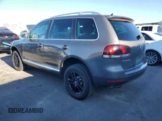 2010 Volkswagen Touareg VR6 with VIN WVGBF7A98AD001335, listed as a Copart auction lot 81735614 with 160,478 mi miles and Salvage Title. Bid and sale history available at DreamBid. Image 2.