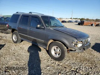 1999 Ford Explorer XL with VIN 1FMZU34X8XUC31019, listed as a Copart auction lot 87831635 with 220,683 mi miles and Salvage title. Bid and sale history available at DreamBid. Image 4.