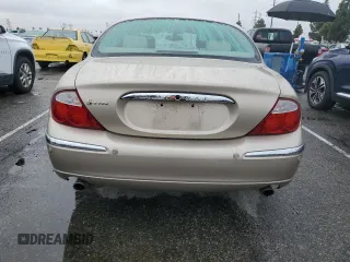 2003 Jaguar S-Type with VIN SAJEA01T93FM49689, listed as a Copart auction lot 43930875 with 303,648 mi miles and Clean Title. Bid and sale history available at DreamBid. Image 6.