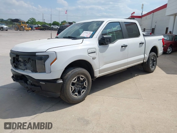 2023 Ford F-150 Lightning Pro with VIN 1FTVW1EL2PWG18764, listed as a IAAI auction lot 41908278 with 16,276 mi miles and . Bid and sale history available at DreamBid. Image 21.