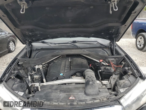 2015 BMW X5 sDrive35i with VIN 5UXKR2C57F0H37742, listed as a Copart auction lot 47573415 with 142,259 mi miles and Clean Title. Bid and sale history available at carsss.com. Image 12.