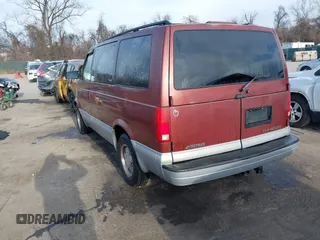 1999 Chevrolet Astro with VIN 1GNEL19W5XB102247, listed as a IAAI auction lot 41598483 with 184,041 mi miles. Bid and sale history available at carsss.com. Image 3.