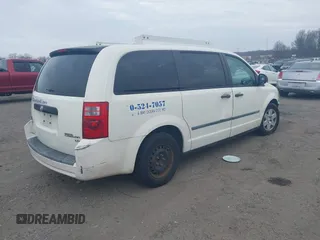 2009 Dodge Grand Caravan Cargo with VIN 2D4HN11E89R693782, listed as a IAAI auction lot 41693620 with 118,956 mi miles. Bid and sale history available at carsss.com. Image 4.