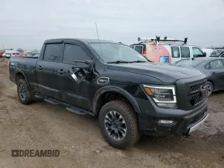 2020 Nissan Titan XD Platinum Reserve with VIN 1N6AA1FB8LN510908, listed as a Copart auction lot 49308085 with 60,154 mi miles and Salvage Title. Bid and sale history available at carsss.com. Image 4.