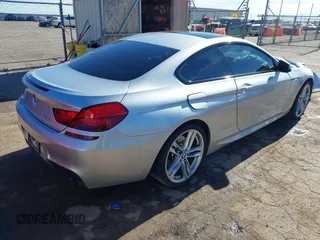 2014 BMW 6 Series 650i with VIN WBAYM9C57ED248195, listed as a IAAI auction lot 41231716 with Not Provided miles and . Bid and sale history available at carsss.com. Image 4.
