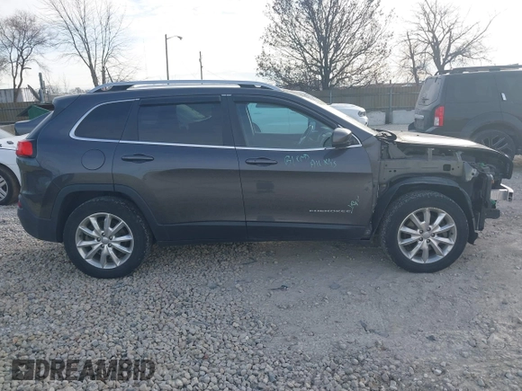 2017 Jeep Cherokee Limited with VIN 1C4PJMDBXHW582616, listed as a IAAI auction lot 41063889 with 125,839 mi miles and . Bid and sale history available at DreamBid. Image 14.