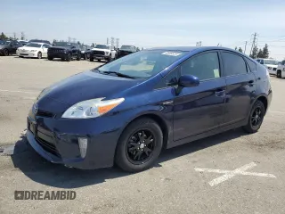 2015 Toyota Prius Four with VIN JTDKN3DU5F0423660, listed as a Copart auction lot 60698525 with 153,636 mi miles and Salvage title. Bid and sale history available at DreamBid. Image 1.