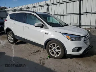 2018 Ford Escape SE with VIN 1FMCU0G96JUC41704, listed as a Copart auction lot 77678304 with 0 mi miles and Salvage Title. Bid and sale history available at carsss.com. Image 4.