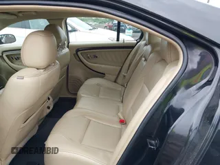 2014 Ford Taurus Limited z VIN 1FAHP2J8XEG112310, wystawiony jako IAAI lot #42367397 z przebiegiem 77 329 mil mil oraz . Historia ofert i sprzedaży dostępna na DreamBid. Obrazek 8.