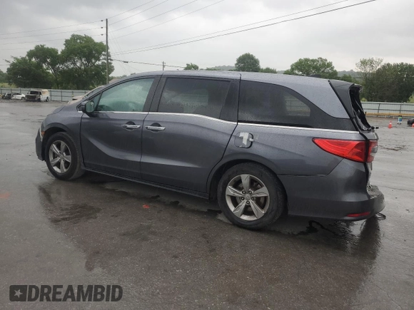 2018 Honda Odyssey EX with VIN 5FNRL6H50JB047999, listed as a Copart auction lot 57819495 with 121,295 mi miles and Salvage title. Bid and sale history available at DreamBid. Image 2.