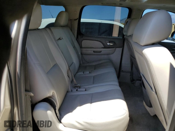 2013 Chevrolet Suburban LT with VIN 1GNSCJE06DR140058, listed as a Copart auction lot 56317995 with 124,345 mi miles and Salvage title. Bid and sale history available at DreamBid. Image 11.