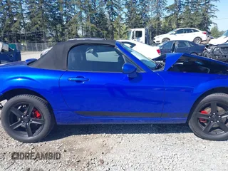 2006 Mazda MX-5 Miata Touring z VIN JM1NC25F560104482, wystawiony jako IAAI lot #42045035 z przebiegiem 131 892 mil mil oraz . Historia ofert i sprzedaży dostępna na DreamBid. Obrazek 14.