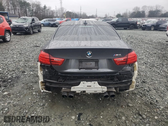 2015 BMW M4 with VIN WBS3R9C54FK330180, listed as a Copart auction lot 40706044 with 69,474 mi miles. Bid and sale history available at carsss.com. Image 6.