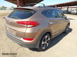 2016 Hyundai Tucson Sport with VIN KM8J33A20GU211615, listed as a IAAI auction lot 41685718 with 97,458 mi miles. Bid and sale history available at carsss.com. Image 4.