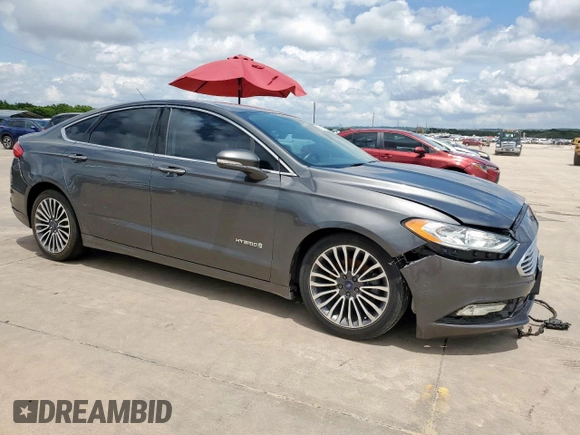 2017 Ford Fusion Hybrid Titanium with VIN 3FA6P0RU1HR368930, listed as a Copart auction lot 64965075 with 180,607 mi miles and Clean title. Bid and sale history available at DreamBid. Image 4.