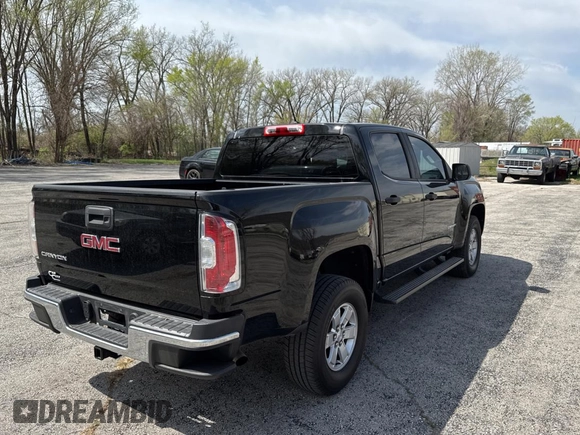 2017 GMC Canyon 2WD with VIN 1GTG5BEN5H1176886, listed as a Copart auction lot 52742165 with 141,096 mi miles and Clean Title. Bid and sale history available at carsss.com. Image 4.