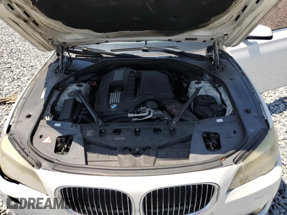 2012 BMW 7 Series 740i with VIN WBAKA4C59CDS99079, listed as a Copart auction lot 53299695 with 142,692 mi miles and Clean Title. Bid and sale history available at carsss.com. Image 11.