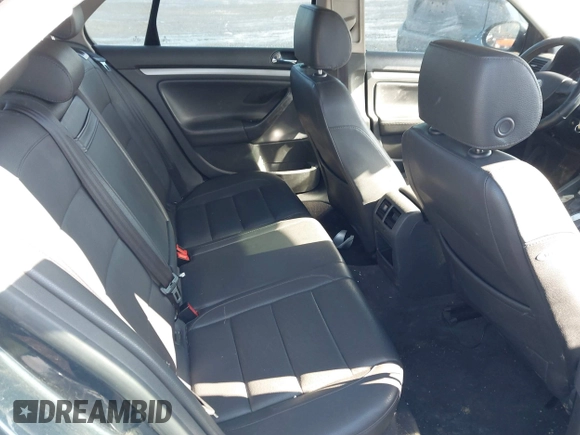 2005 Volkswagen Jetta with VIN 3VWST71K95M634210, listed as a IAAI auction lot 41552649 with 296,831 mi miles and . Bid and sale history available at DreamBid. Image 8.