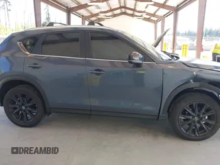 2024 Mazda CX-5 S Carbon Edition with VIN JM3KFBCL2R0510458, listed as a IAAI auction lot 42184516 with 4,474 mi miles and . Bid and sale history available at DreamBid. Image 13.