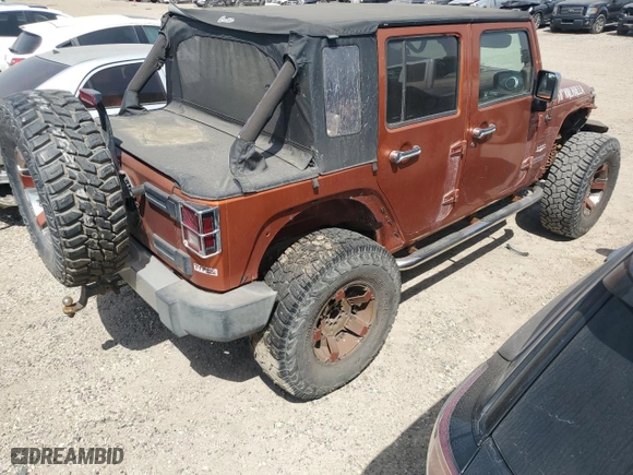 2011 Jeep Wrangler Unlimited Sahara with VIN 1J4BA5H16BL597585, listed as a Copart auction lot 48616315 with 149,324 mi miles and Clean Title. Bid and sale history available at carsss.com. Image 3.