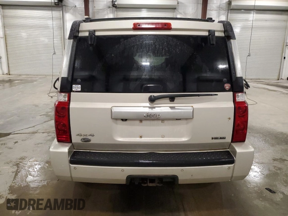 2007 Jeep Commander Overland z VIN 1J8HG68237C610869, wystawiony jako Copart lot #59824675 z przebiegiem 229 092 mil mil oraz Szkoda całkowita • Salvage title. Historia ofert i sprzedaży dostępna na DreamBid. Obrazek 6.